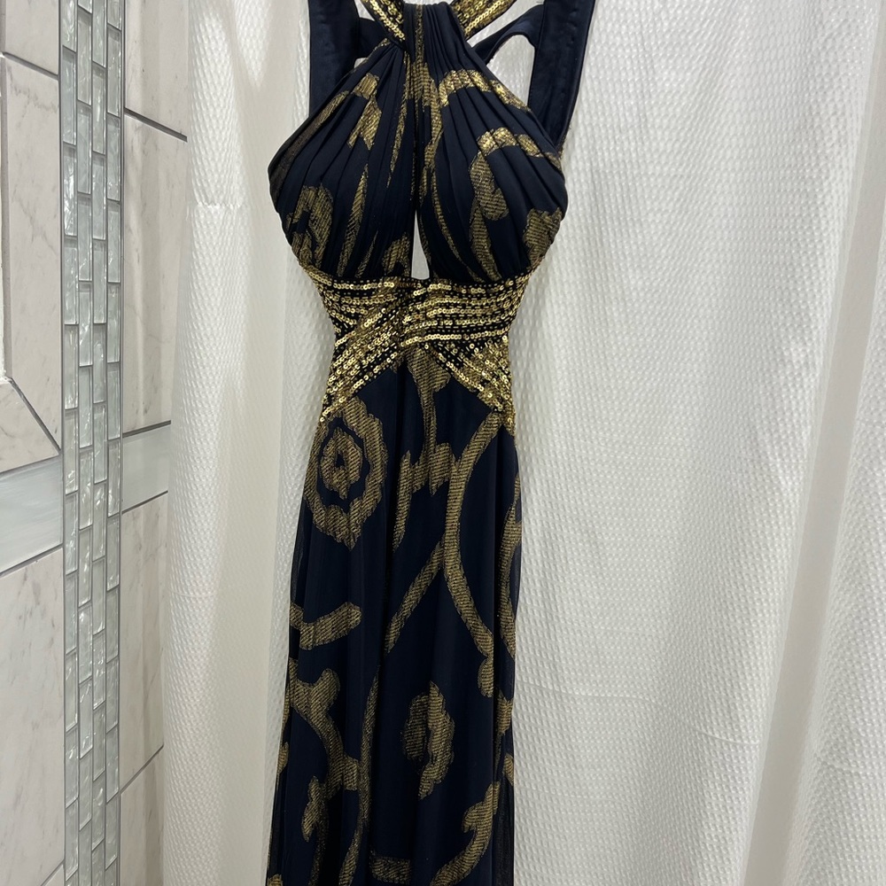 Prom dress Betsy Adam design 
Size 4, color dark blue and gold